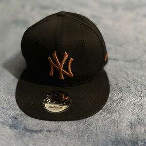 New Era Black and Gold Snapback Cap